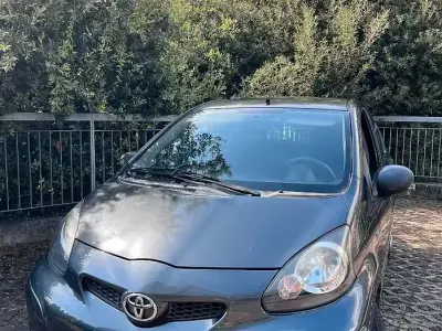 Usata Toyota Aygo 68 CV (50 kW) 2010 Grigio Utilitaria
