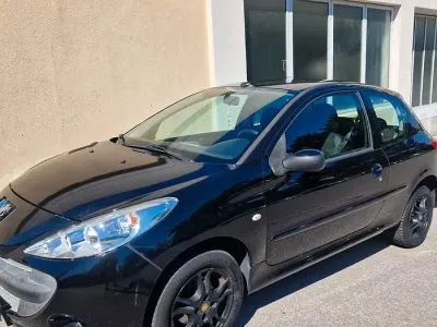 Usata Peugeot 206+ 60 CV (44 kW) 2011 Nero Utilitaria