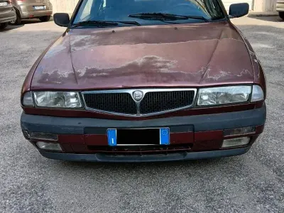 Usata Lancia Delta 103 CV (75 kW) 1994 Rosso Utilitaria