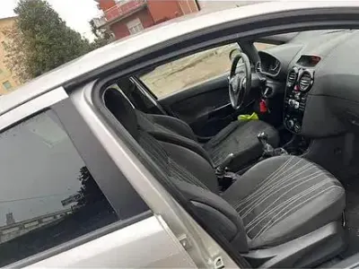 Usata Opel Corsa 75 CV (55 kW) 2011 Grigio Utilitaria