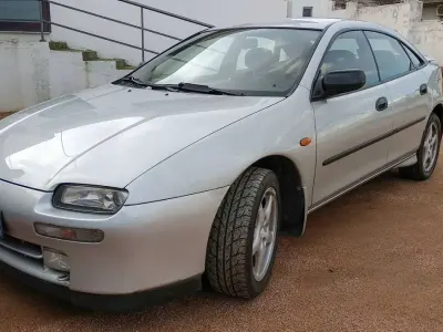 Usata Mazda 323F 144 CV (105 kW) 1999 Argento Berlina