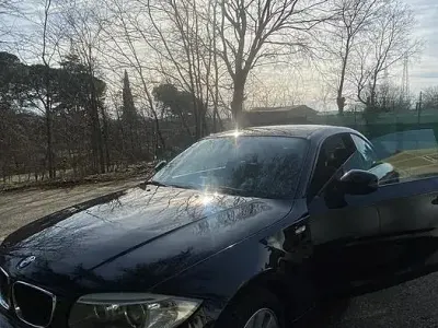 Usata BMW 120 177 CV (130 kW) 2011 Nero Utilitaria