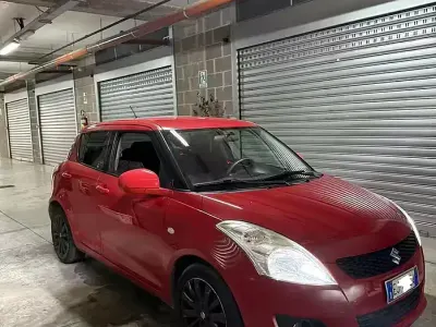 Usata Suzuki Swift 94 CV (69 kW) 2011 Rosso Utilitaria