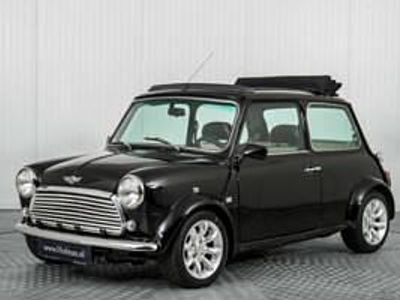 Begagnad Mini Cooper 58 HK (42 kW) 1998 Svart Halvkombi