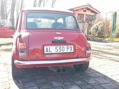 Usata Rover Mini 63 CV (46 kW) 1996 Rosso Utilitaria