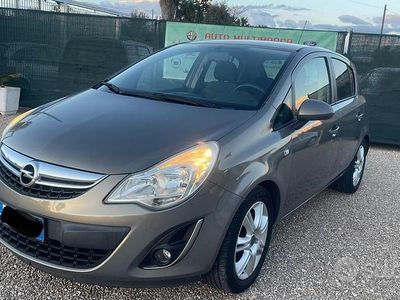 Usata Opel Corsa Cosmo 75 CV (55 kW) 2011 Marrone Utilitaria