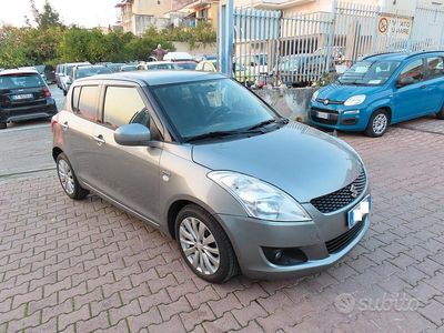 Käytetty Suzuki Swift Style 75 HP (55 kW) 2012 Harmaa Sedan