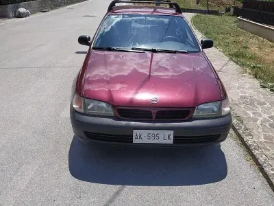Usata Toyota Carina E 106 CV (77 kW) 1997 Rosso Berlina