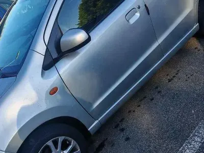 Usata Nissan Pixo 68 CV (50 kW) 2011 Grigio Utilitaria