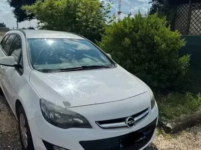 Usata Opel Astra 115 CV (84 kW) 2014 Bianco Station wagon