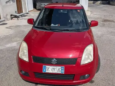 Usata Suzuki Swift 102 CV (75 kW) 2006 Rosso Utilitaria