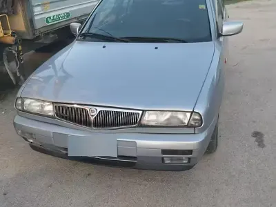 Usata Lancia Delta 103 CV (75 kW) 1999 Grigio Utilitaria