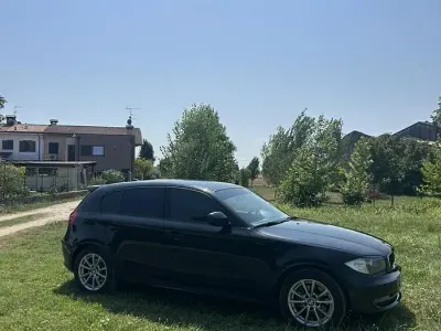 Usata BMW 118 143 CV (105 kW) 2010 Nero Utilitaria