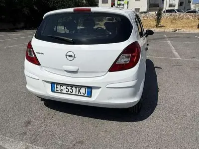 Usata Opel Corsa Club 65 CV (47 kW) 2011 Bianco Utilitaria