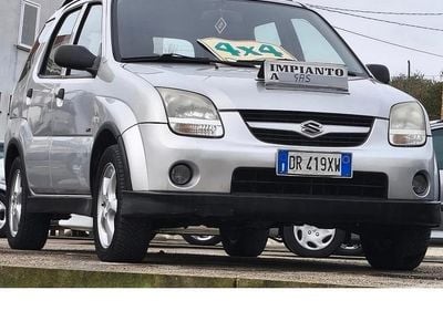Usado Suzuki Ignis 99 CV (72 kW) 2008 Gris Utilitario