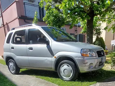 Usado Suzuki Ignis GL 83 CV (61 kW) 2002 Gris Utilitario