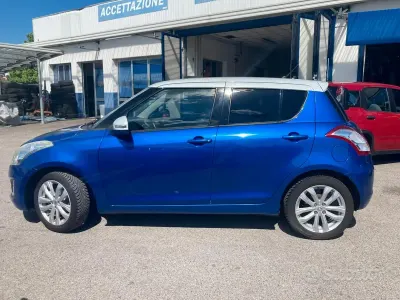 Second-hand Suzuki Swift 94 CP (69 kW) 2014 Albastru Hatchback