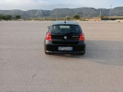 Usata BMW 120 177 CV (130 kW) 2010 Nero Utilitaria