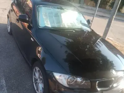 Usata BMW 116 116 CV (85 kW) 2011 Nero Utilitaria