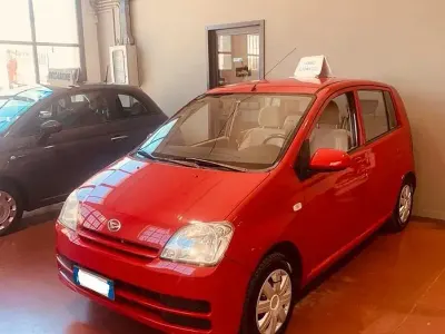 Usata Daihatsu Cuore 58 CV (42 kW) 2006 Rosso Utilitaria