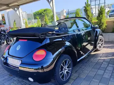 Usado VW New Beetle 101 CV (74 kW) 2004 Negro Utilitario