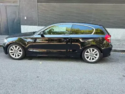 Usata BMW 120 177 CV (130 kW) 2009 Nero Utilitaria