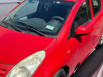Używany Nissan Pixo 68 KM (50 kW) 2010 Czerwony Hatchback