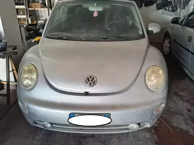 Usata VW New Beetle 101 CV (74 kW) 2004 Grigio Utilitaria