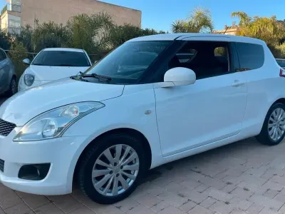 Usata Suzuki Swift 93 CV (68 kW) 2013 Bianco Utilitaria