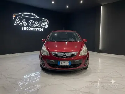 Usata Opel Corsa Club 85 CV (62 kW) 2011 Rosso Utilitaria