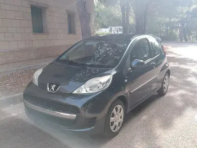 Usata Peugeot 107 68 CV (50 kW) 2010 Grigio Utilitaria