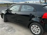 Usata Kia Rio 75 CV (55 kW) 2012 Nero Berlina