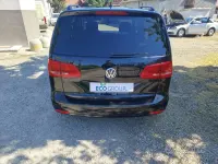 Käytetty VW Touran Comfortline 105 HP (77 kW) 2012 Musta Tila-auto