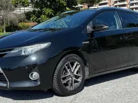 Usata Toyota Auris Hybrid Active 99 CV (72 kW) 2015 Nero Station wagon
