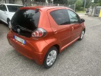 Usata Toyota Aygo Edition 68 CV (50 kW) 2012 Arancione Utilitaria