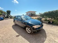 Usata BMW 118 122 CV (89 kW) 2006 Nero Utilitaria