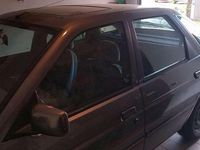 Usata Ford Escort Ghia 88 CV (64 kW) 1992 Grigio Berlina