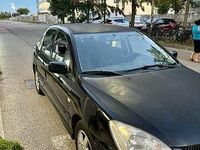 Usata Mitsubishi Lancer Comfort Edition 98 CV (72 kW) 2010 Nero Berlina