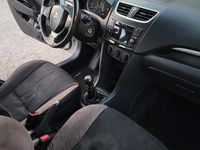 Usata Suzuki Swift 93 CV (68 kW) 2012 Bianco Utilitaria