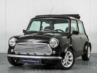 Begagnad Mini Cooper 58 HK (42 kW) 1998 Svart Halvkombi