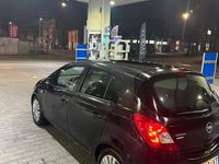 Usata Opel Corsa 54 CV (39 kW) 2012 Nero Berlina