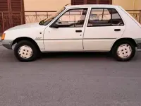 Usata Peugeot 205 60 CV (44 kW) 1990 Bianco Berlina