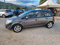 Usata Opel Corsa 65 CV (47 kW) 2012 Grigio Utilitaria