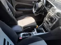 Käytetty Ford Focus 100 HP (73 kW) 2011 Musta Farmari