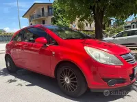 Usata Opel Corsa 80 CV (58 kW) 2010 Rosso Utilitaria