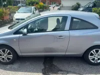 Usata Opel Corsa Club 80 CV (58 kW) 2011 Argento Utilitaria