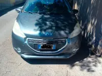 Usata Peugeot 208 82 CV (60 kW) 2012 Grigio Utilitaria