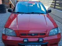 Usata Subaru Justy 68 CV (50 kW) 1997 Rosso Utilitaria
