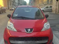 Usata Peugeot 107 68 CV (50 kW) 2011 Rosso Utilitaria