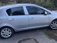 Usado Opel Corsa 75 CV (55 kW) 2010 Gris Utilitario